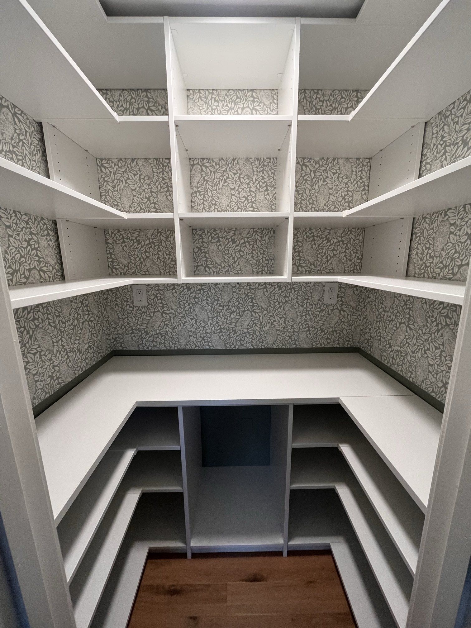 Custom pantry wraparound shelves, installed by Closets For Less