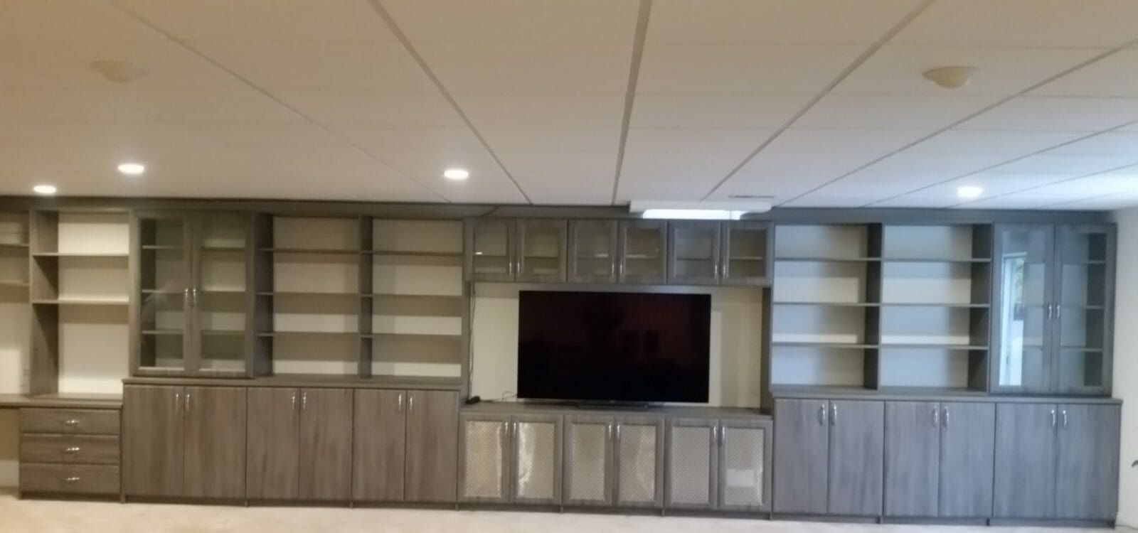 Entertainment wall unit TV, installed by Closets For Less