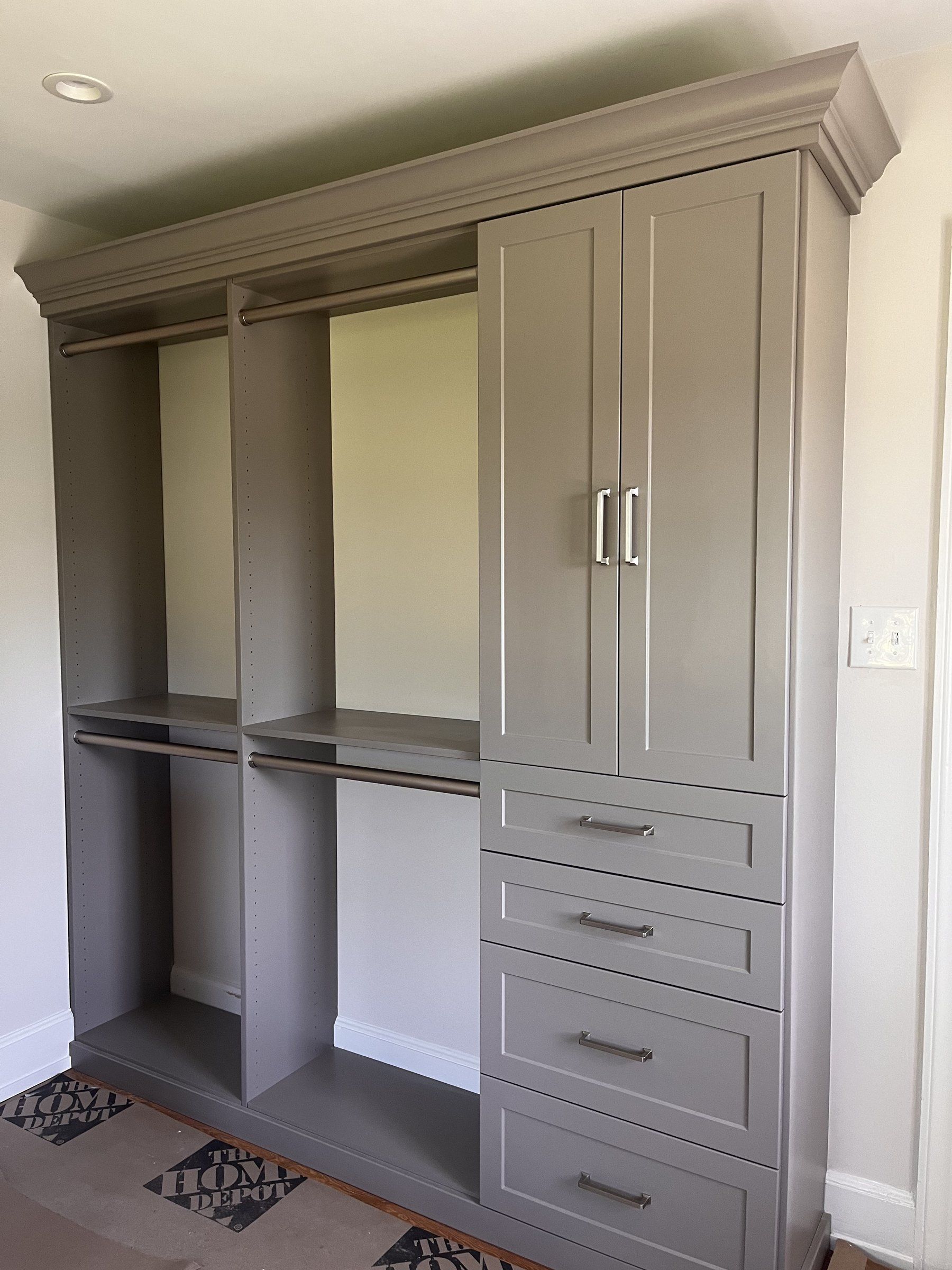 Gray wardrobe closet drawers, installed by Closets For Less