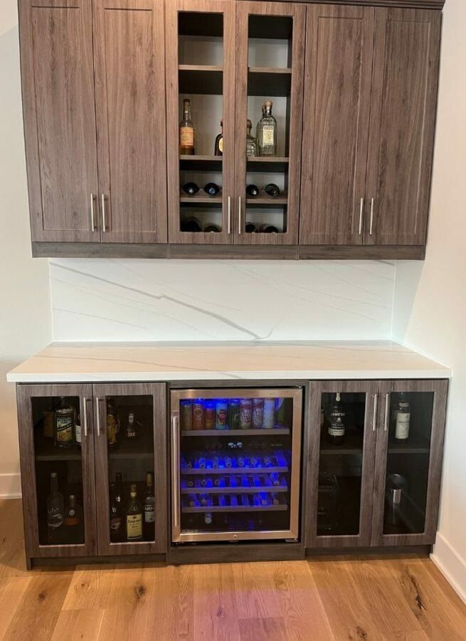 Home bar wine fridge cabinets, installed by Closets For Less