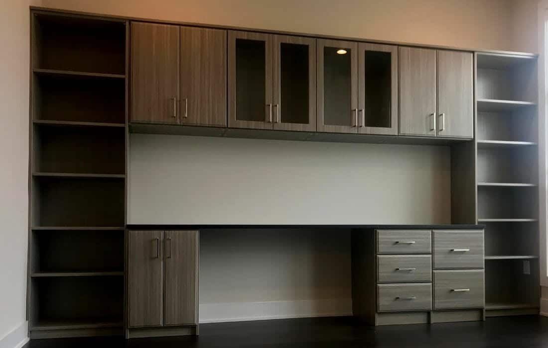 Home office desk wall glass uppers, installed by Closets For Less