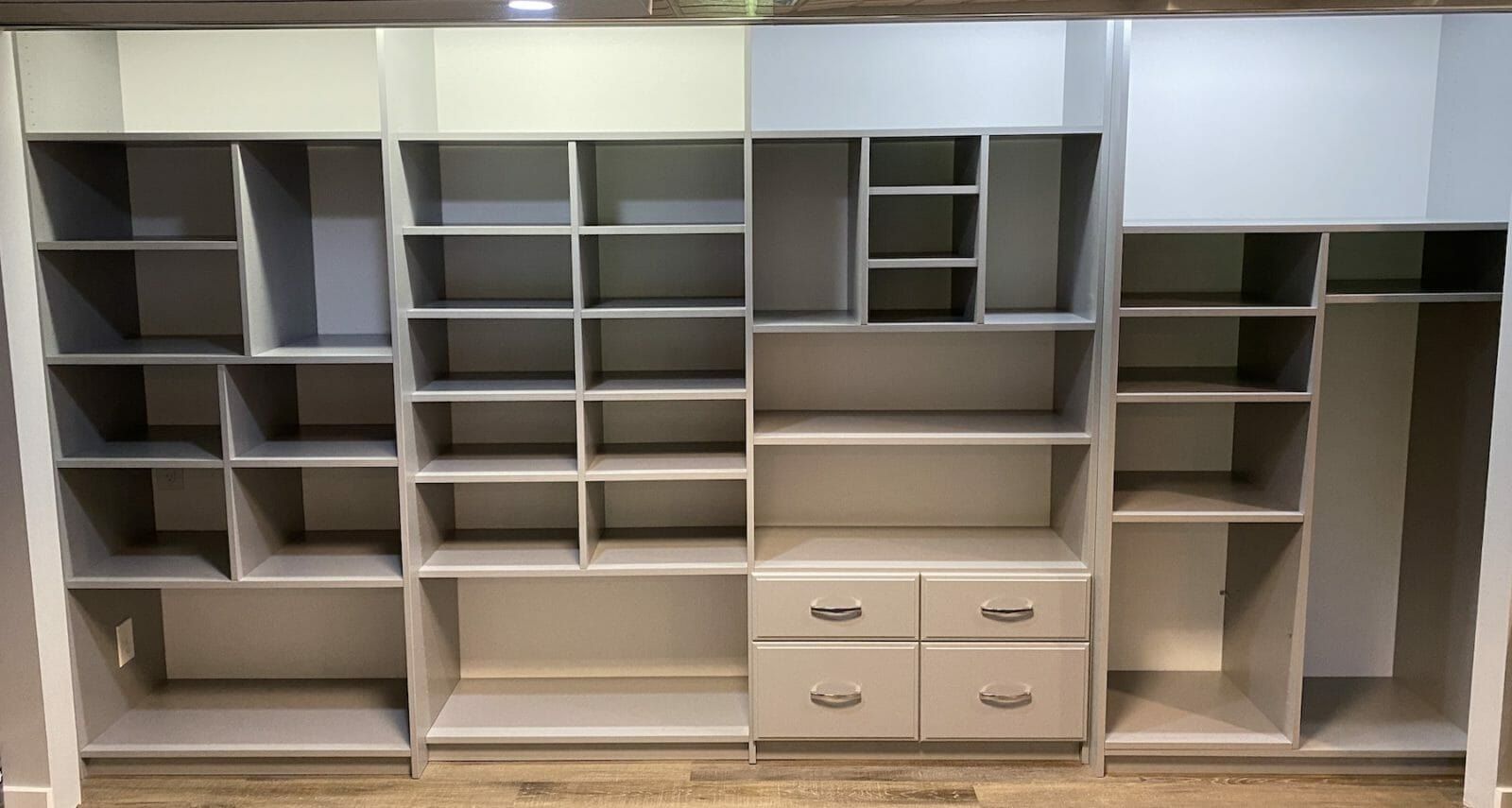 Large reach-in closet gray drawers, installed by Closets For Less