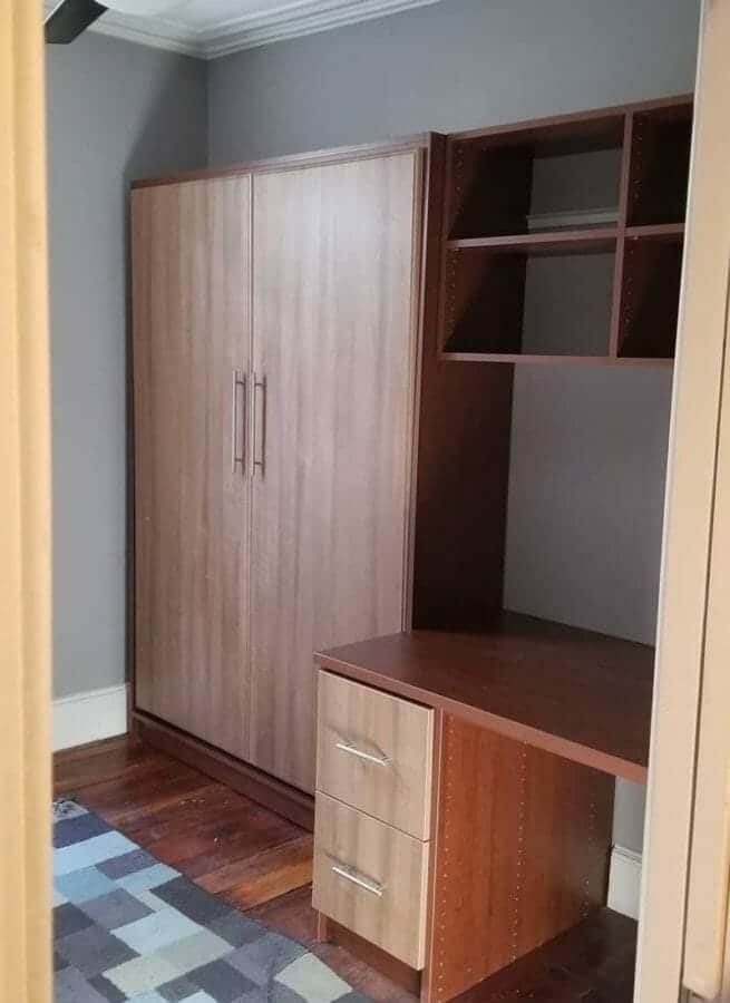 Wall bed cabinet desk combo, installed by Closets For Less