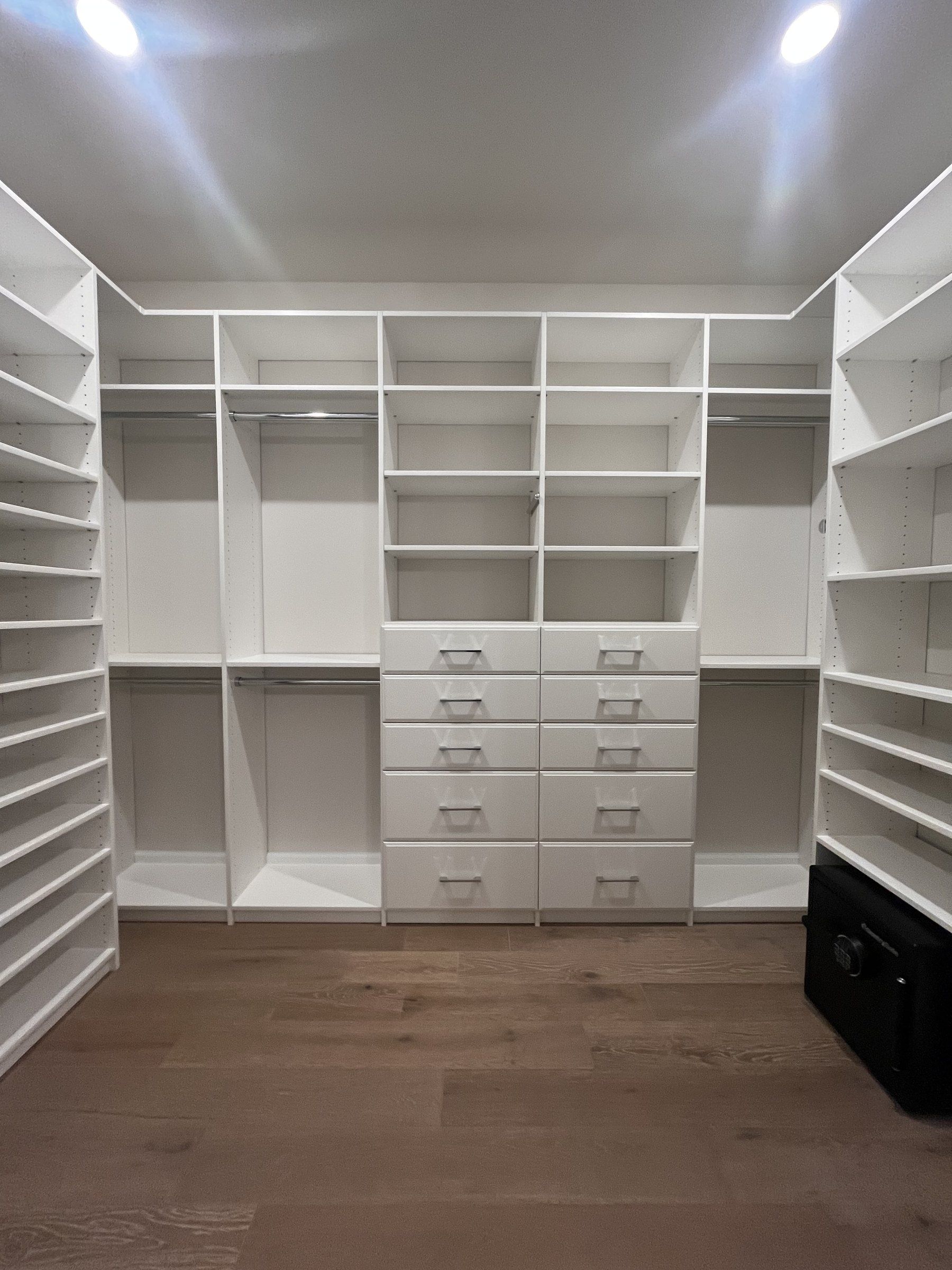 White walk-in closet drawer tower, installed by Closets For Less