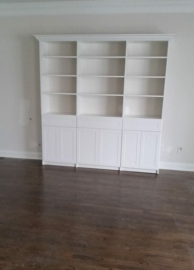 White wall unit built-in bookcase, installed by Closets For Less