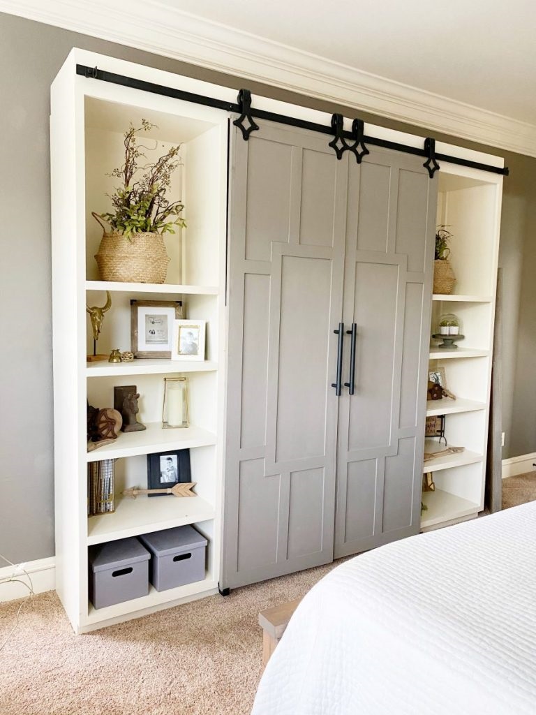 Walk In Closet with Plank Barn Door on Rails - Cottage - Closet