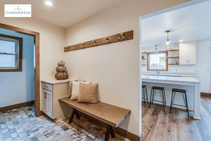 Mudroom entry between garage and kitchen with dual storage