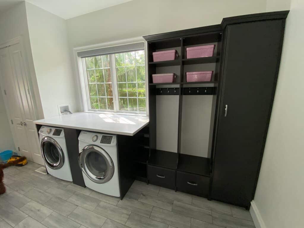 Sectioned mudroom cabinet for laundry room overflow storage