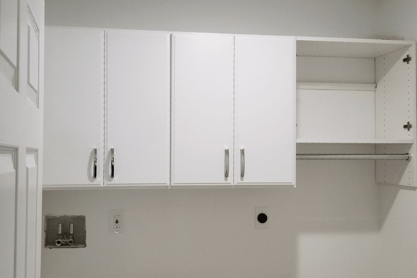 Upper cabinets in mudroom for seasonal gear storage